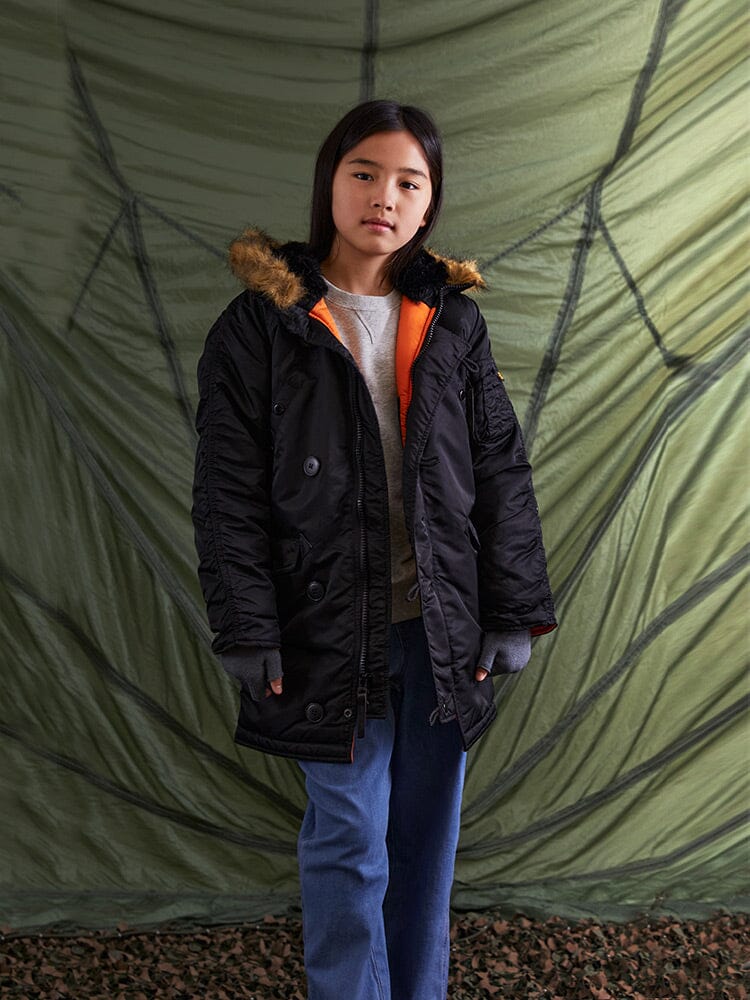 Alpha Industries N-3b Parka Youth, water-resistant with fur-lined hood.