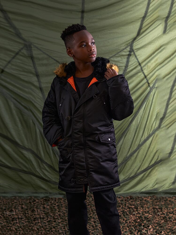 Alpha Industries N-3B Parka Youth, black, water-resistant parka with fur-lined hood.