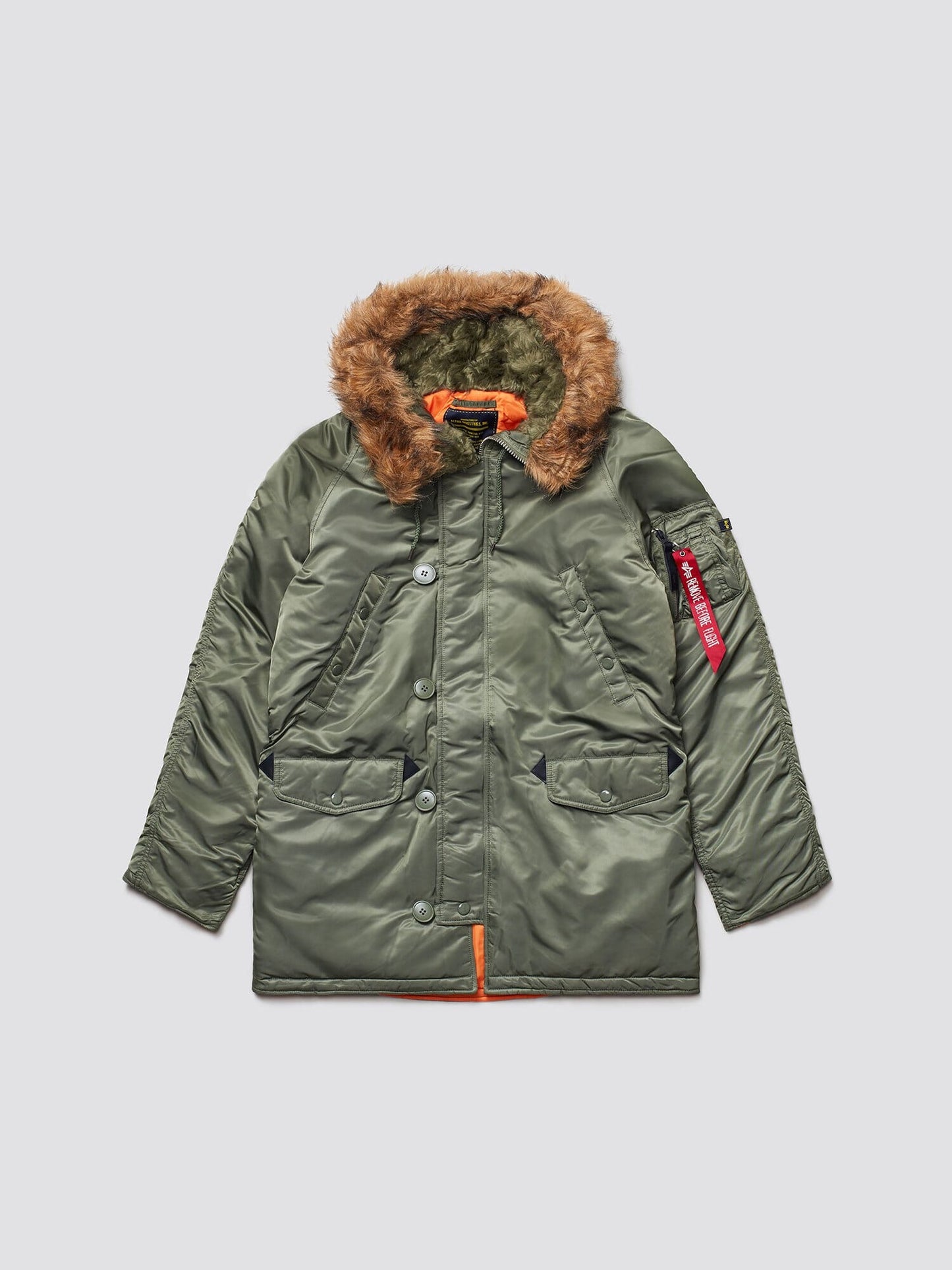 Alpha Industries N-3B Slim Gen I Parka, olive green, fur-lined hood, water-resistant fabric, front button and zipper closure, two front pockets, red tag on left sleeve.