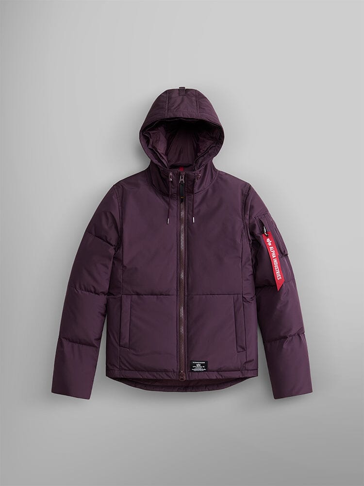 Alpha Industries Short Parka W, plum color, faux fur hood, front zipper, utility pockets, signature red tag on left sleeve.
