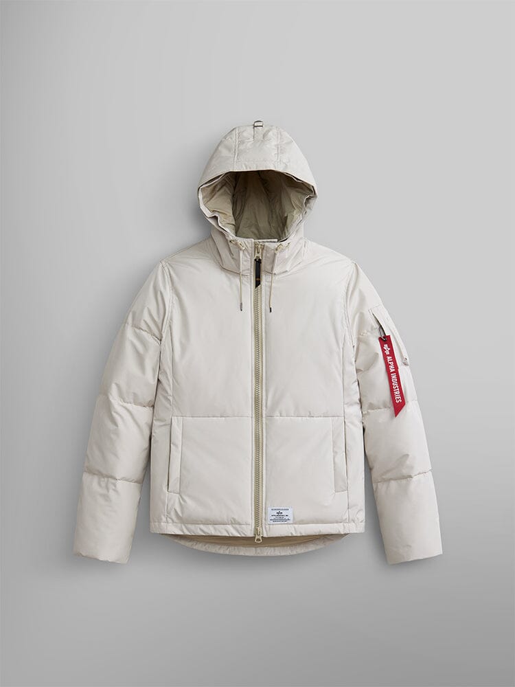 Alpha Industries Short Parka W, light beige, faux fur hood, front zipper, utility pockets, red Remove Before Flight tag on left arm.