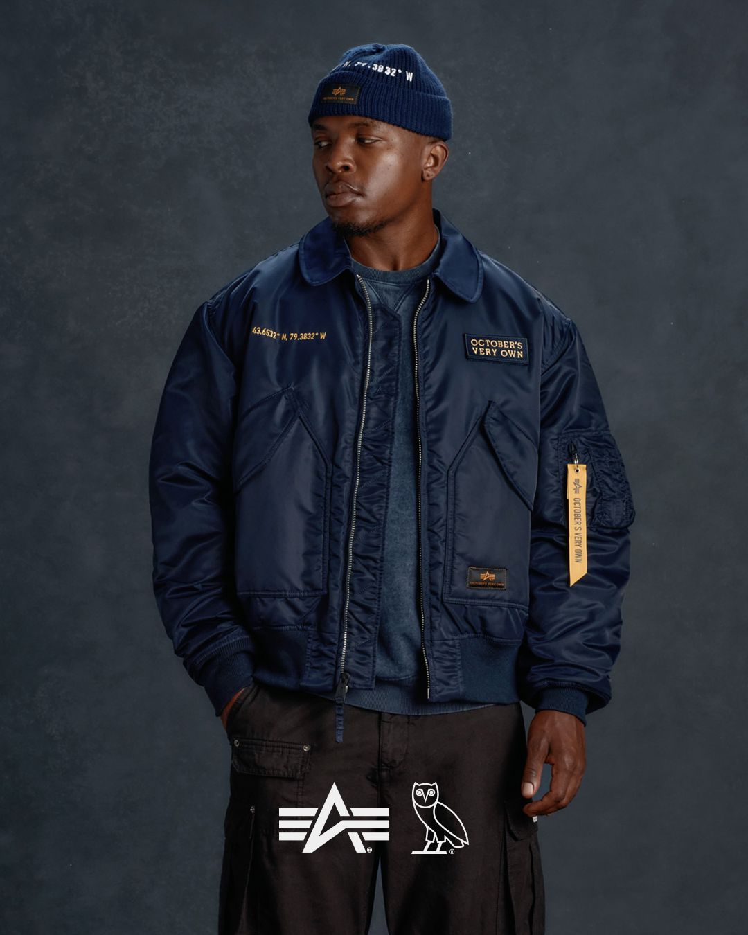 Alpha x October's Very Own collab of jacket, hat and sweats