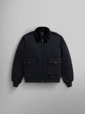 1940s B-10 Bomber Jacket by Alpha Industries in black, features a retro style with a faux fur collar, zip closure, and two buttoned front pockets.