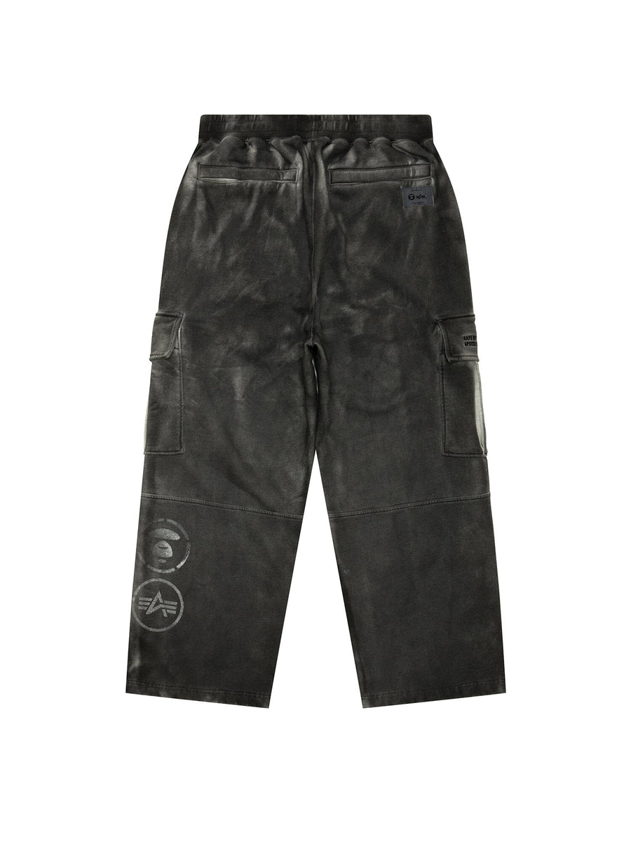 Aape X Alpha Army Sweatpant by Alpha Industries, dark green, military elements, back and side pockets, visible seam details, graphic logos on left leg.