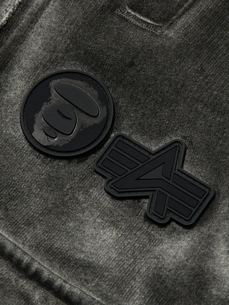 Aape X Alpha Army Sweatpant by Alpha Industries, gray fabric with two black rubber patches, one featuring a stylized ape face and the other a geometric A.