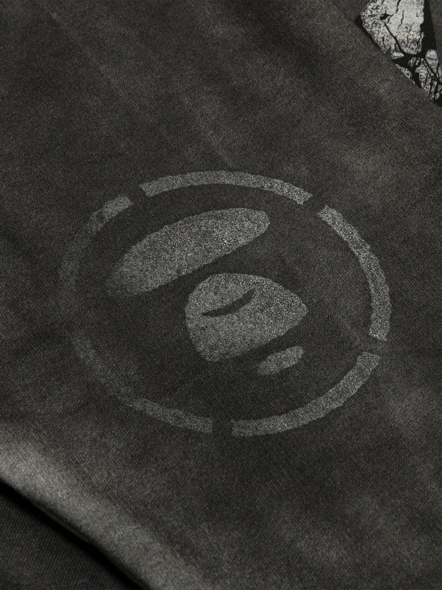 Aape X Alpha Crewneck Sweatshirt, Alpha Industries, black fabric with circular abstract logo in lighter shade.