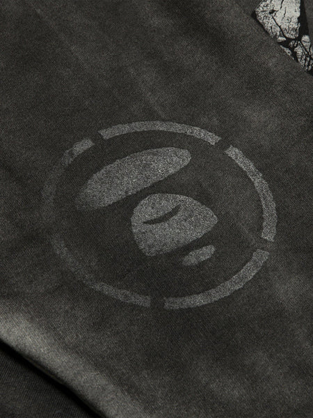 Aape X Alpha Crewneck Sweatshirt, Alpha Industries, black fabric with circular abstract logo in lighter shade.