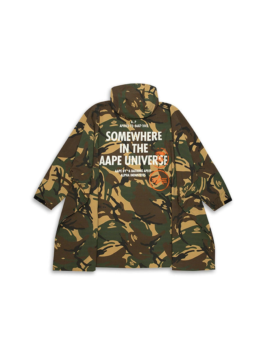 Aape X Alpha Industries 2 Layer Rain Jacket by Alpha Industries – Camouflage rain jacket with high collar, bold white Somewhere in the AAPE Universe text, waterproof materials, orange logos.