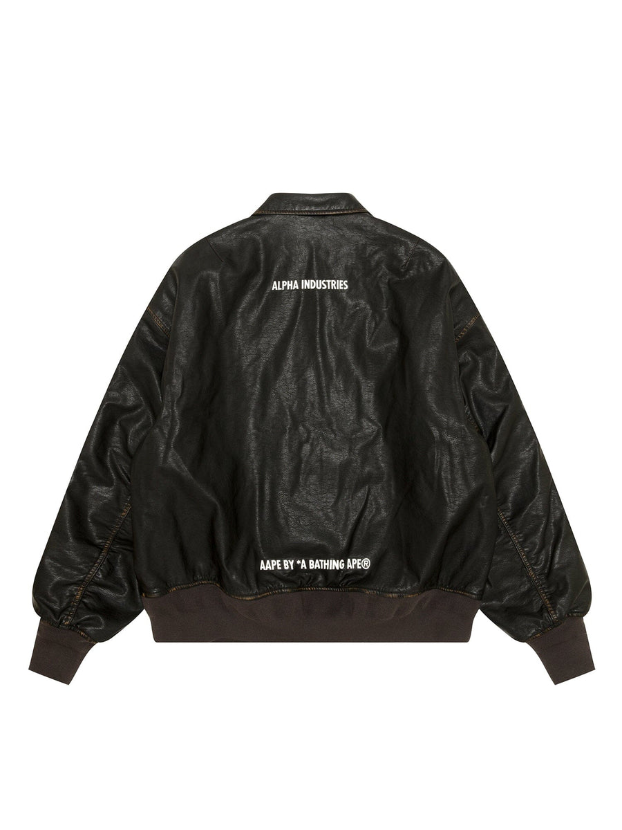 Aape X Alpha Pu Leather Quilted Jacket by Alpha Industries, black pu leather with quilted design, MA-1 silhouette, white co-branding on back.