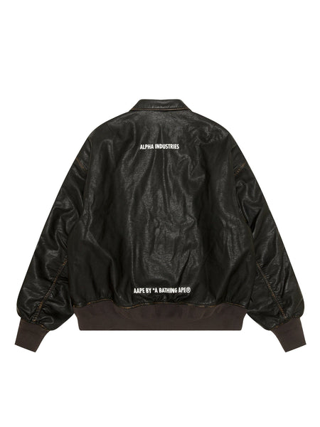 Aape X Alpha Pu Leather Quilted Jacket by Alpha Industries, black pu leather with quilted design, MA-1 silhouette, white co-branding on back.