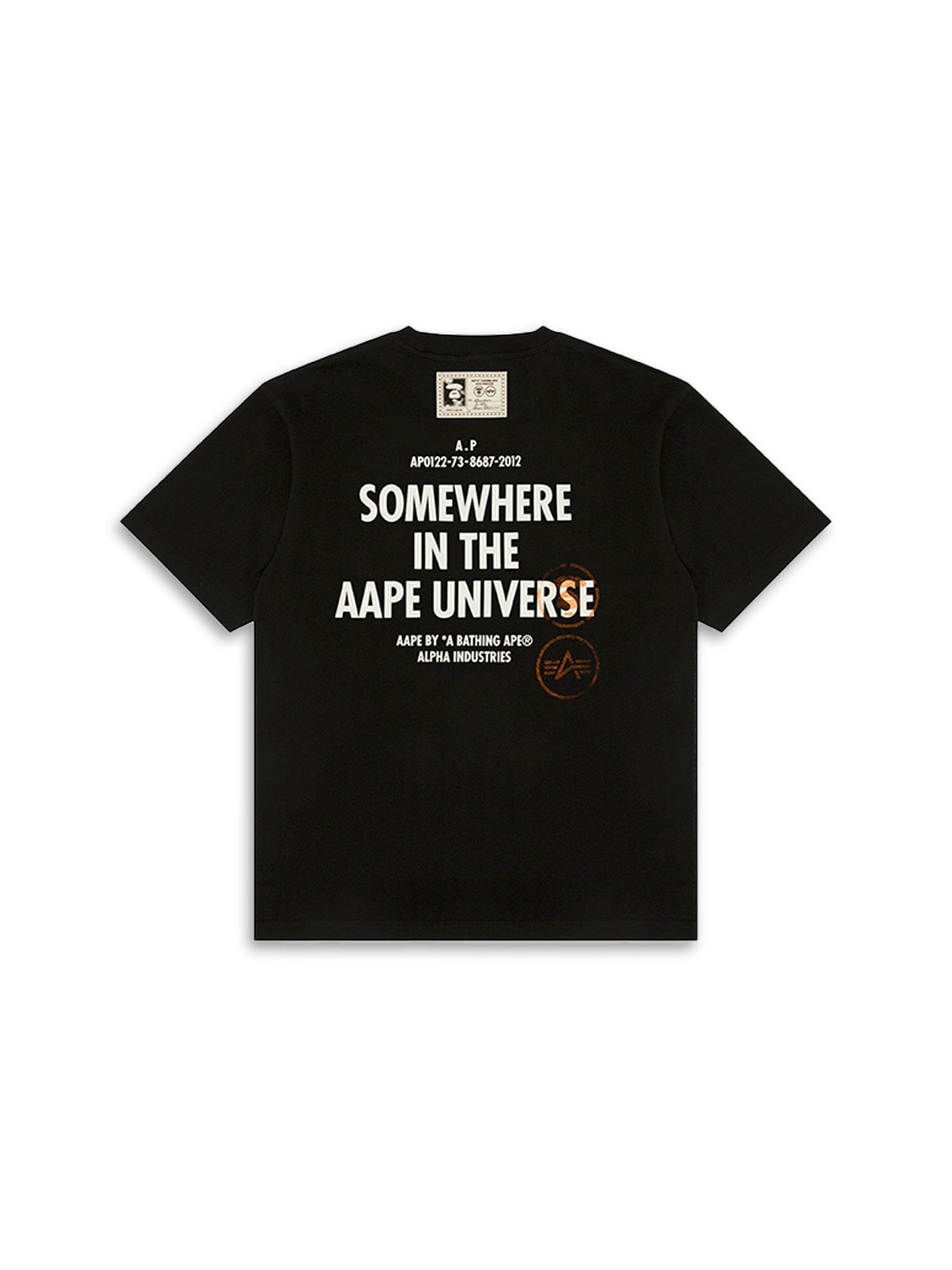 The AAPE X Alpha Somewhere In Universe Tee By Alpha Industries; Features Somewhere in the AAPE Universe Text And Branding on the back.