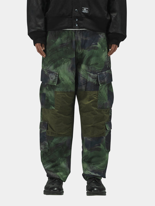 Alpha Industries Acu Pant with utility pockets, black shoes, black jacket.