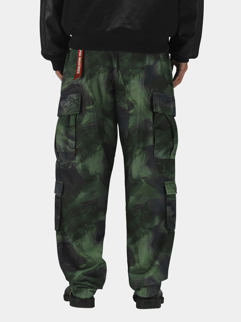 Alpha Industries Acu Pant cargo pants in green camouflage with utility pockets.