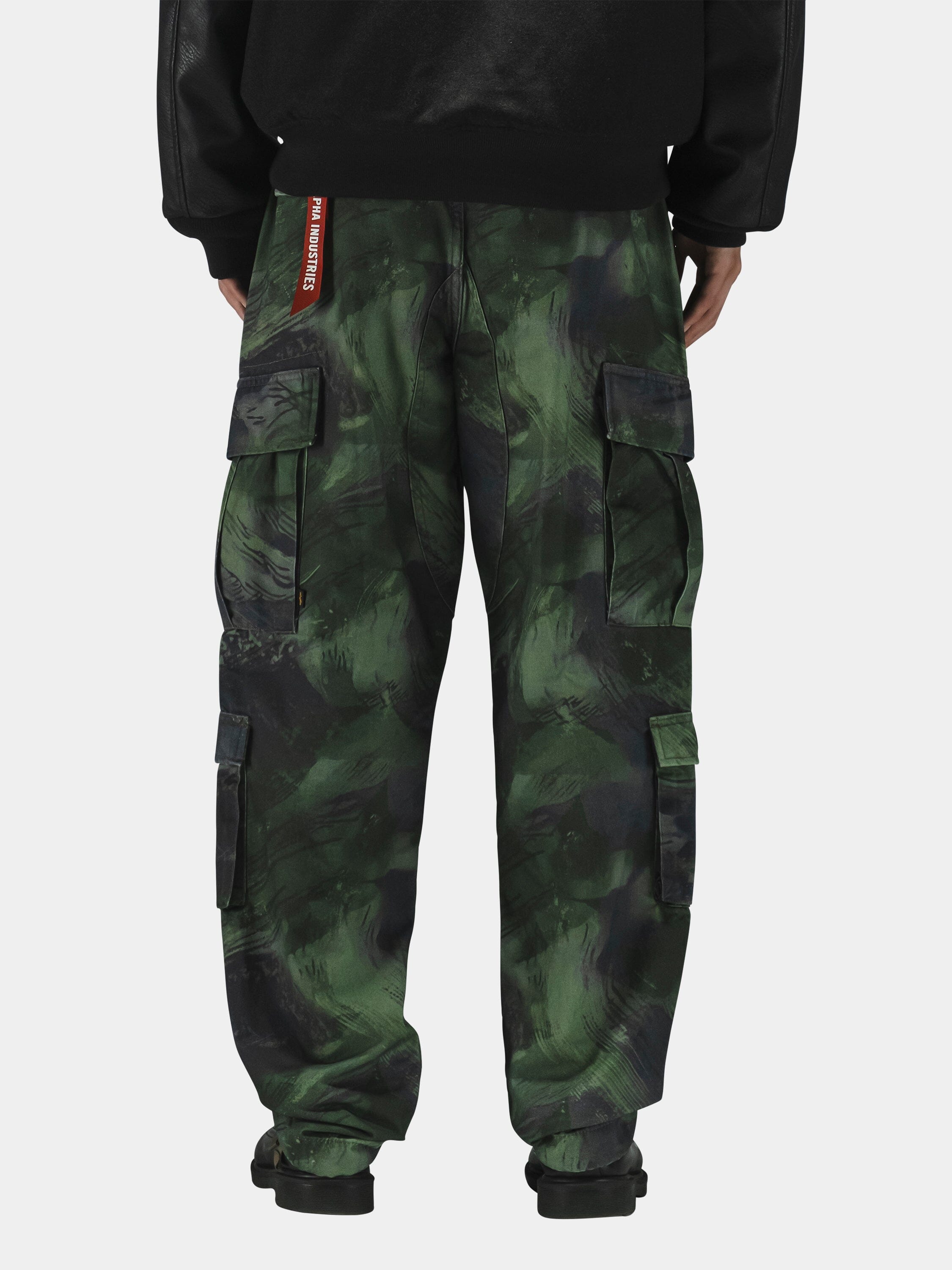 Alpha Industries Acu Pant cargo pants in green camouflage with utility pockets.