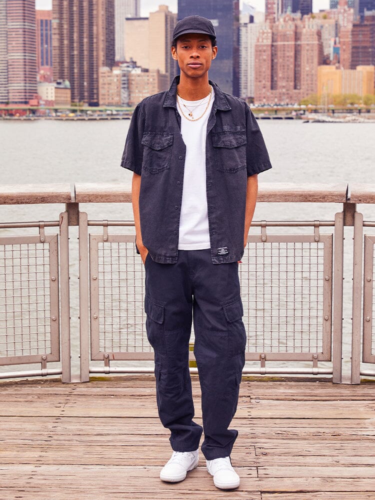 Alpha Industries Acu Pant Cargo Pants, Black Cap, Black Short Sleeve Shirt, White T-Shirt, White Sneakers.