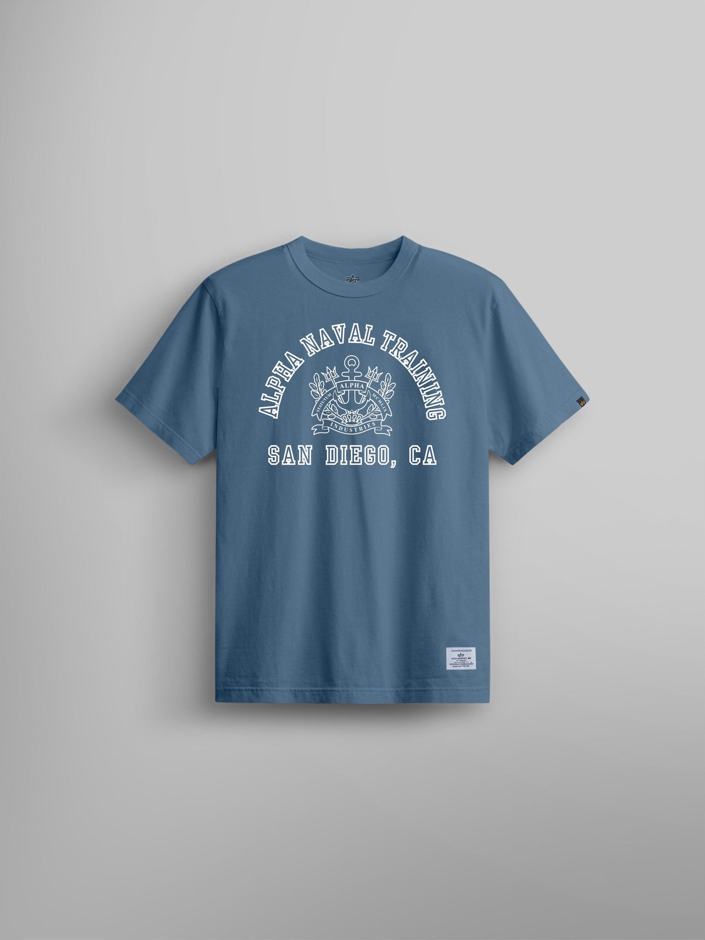 Alpha Industries Alpha Naval Base San Diego Tee, Copen Blue, white text and naval emblem on chest.