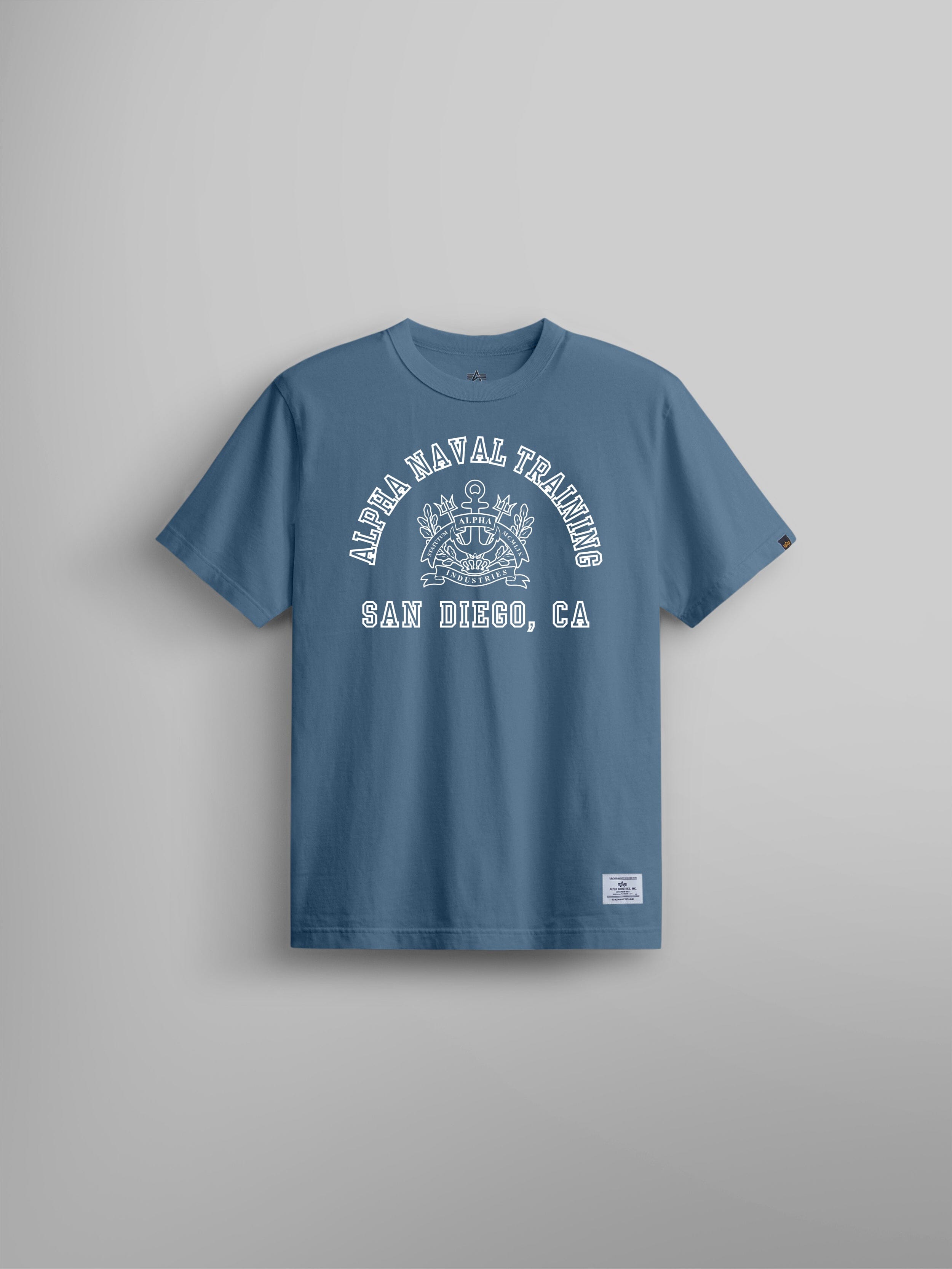Alpha Industries Alpha Naval Base San Diego Tee, Copen Blue, white text and naval emblem on chest.