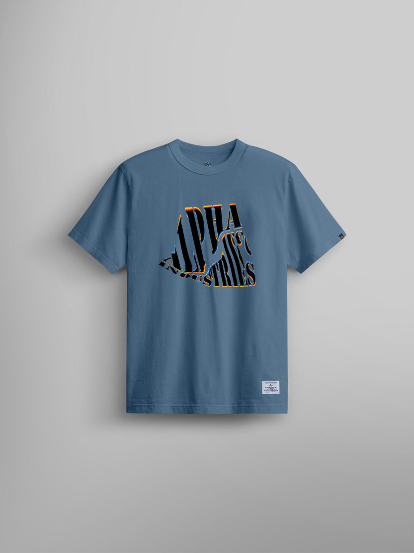 Alpha Warped Tee by Alpha Industries in Copen Blue with black and orange graphics on chest, light gray background.