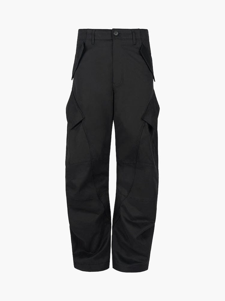 Alpha X Jiyong Kim Curved Multi Pocket Trouser by Alpha Industries in black with multiple pockets, front button and zip closure, curved silhouette.