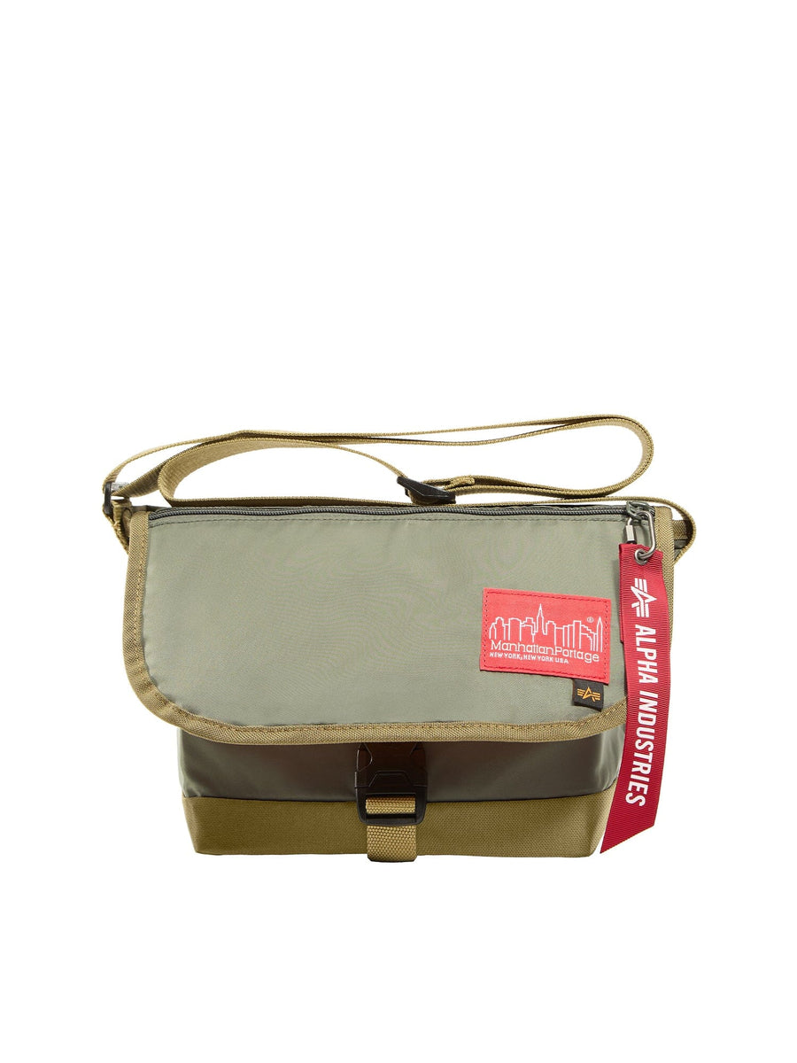 Alpha X Manhattan Portage Nylon Messenger Bag Sm by Alpha Industries, flight nylon, front buckle, top zipper, red NYC patch, branded keychain on right side.
