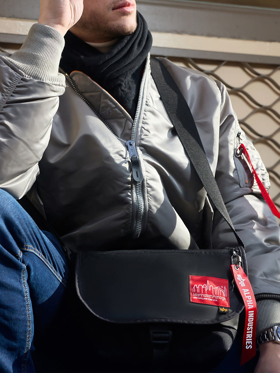 ALPHA X Manhattan Portage Nylon Messenger Bag SM by Alpha Industries, flight nylon fabric, silver color, rescue orange lining, red tag.