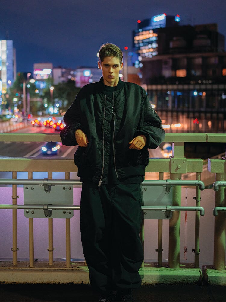 Alpha X Mastermind MA-1 Bomber Jacket by Alpha Industries, black, oversized fit, front zipper closure, ribbed cuffs and hem.