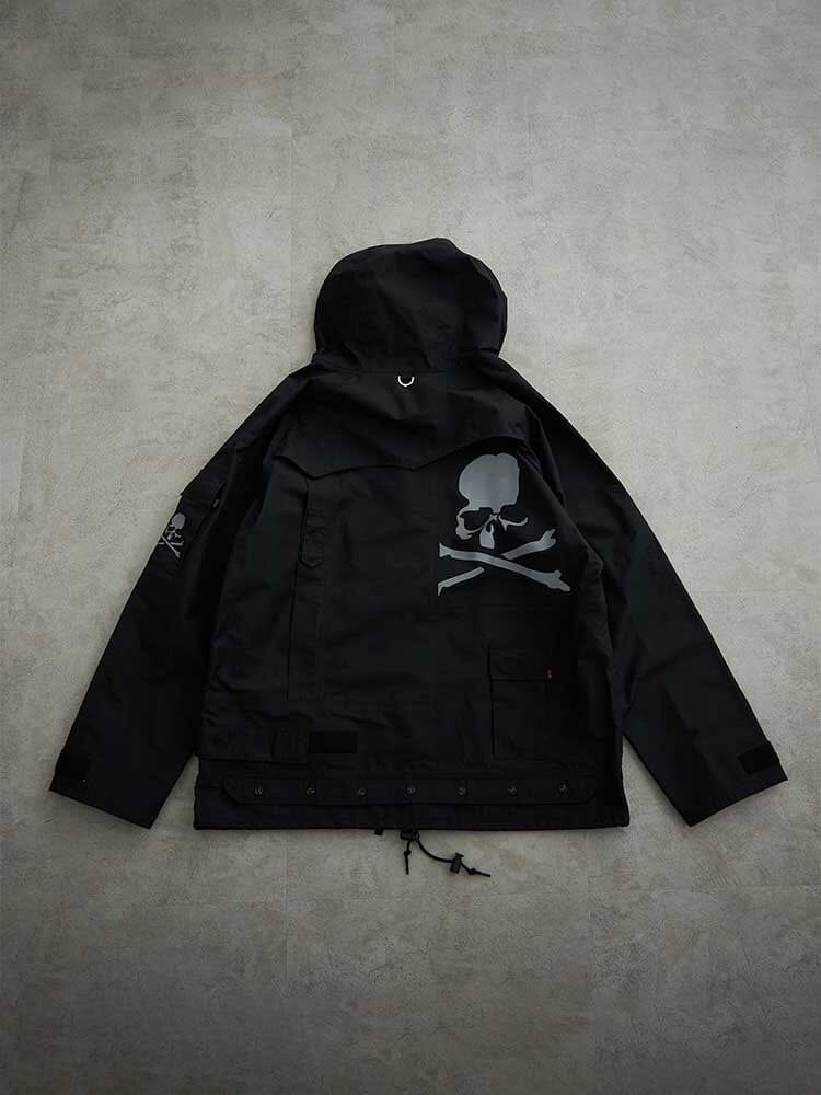 Alpha X Mastermind Nylon Hooded Jacket Alpha Industries MA-1, nylon material, large skull and crossbones graphic on back, small sleeve logo.