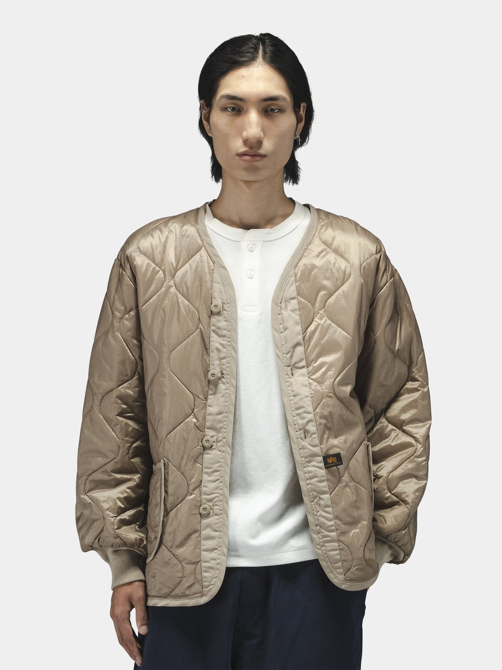 Alpha Industries Als/92 Liner, beige quilted army jacket liner with visible stitching.