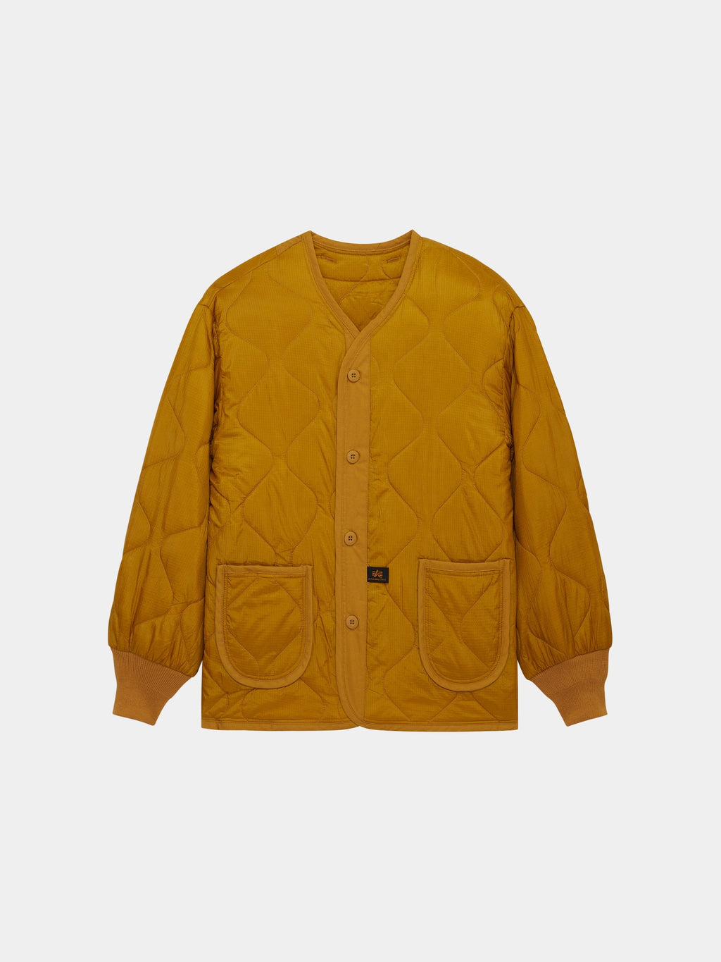 Alpha Industries Als/92 Liner in Tumbleweed, quilted jacket with button front, two patch pockets, ribbed cuffs, V-neck collar.