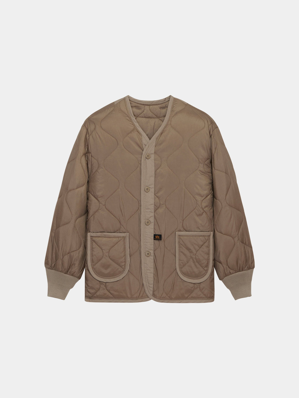 Alpha Industries Als/92 Liner in Vintage Khaki, quilted jacket with V-neck, button front, ribbed cuffs, and two front patch pockets.