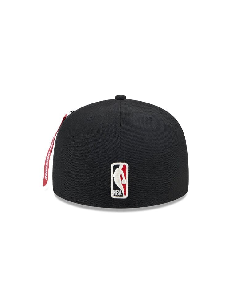 This Chicago Bulls x Alpha x New Era 59Fifty Fitted Cap is adorned with the iconic NBA logo on the back and a vibrant red tag. It's a stylish expression of team pride with authentic flair, making it a must-have accessory for any fan in collaboration with Alpha Industries® and NE-NBA.