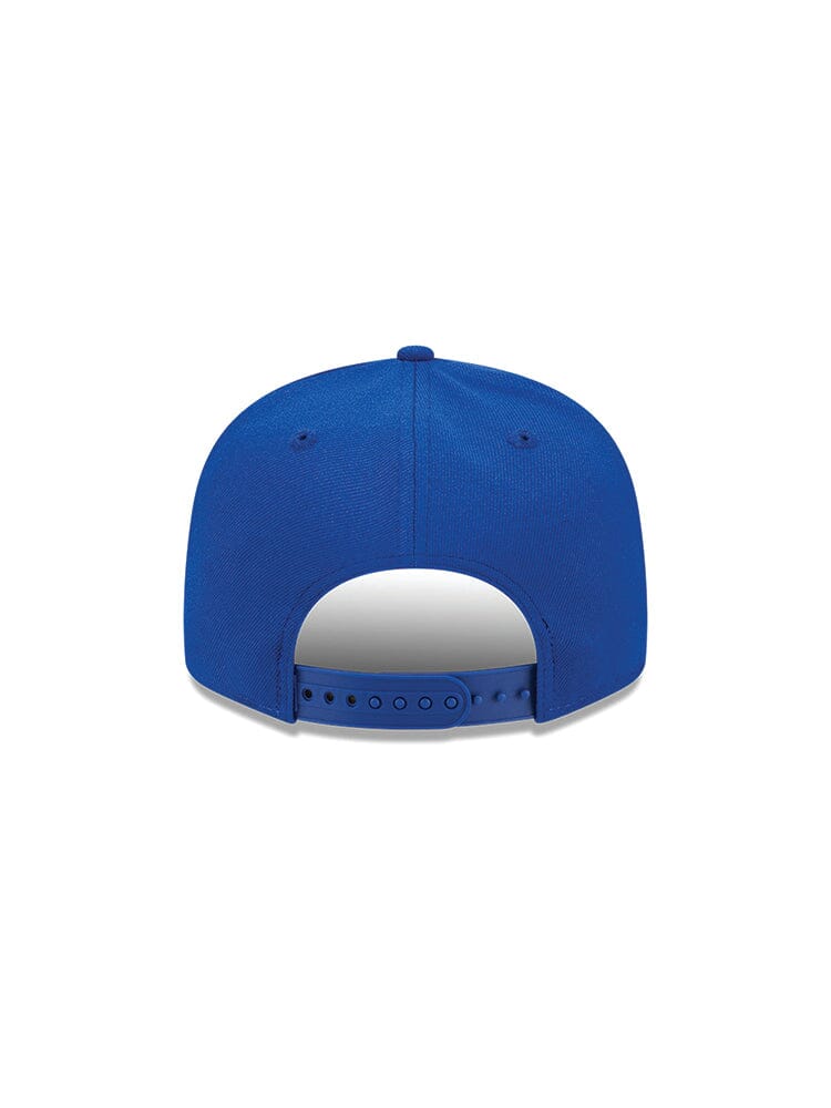 Viewed from the back, the Chicago Cubs x Alpha x New Era 950 Cap in blue showcases a convenient snapback closure and ventilation holes, making it an ideal choice for enthusiasts of the Alpha Industries collaboration.