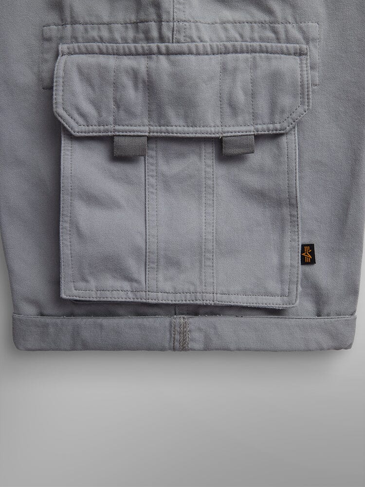 Alpha Industries Crew Short, gray cotton with cargo pocket, flap with two tabs, black and yellow side tag.