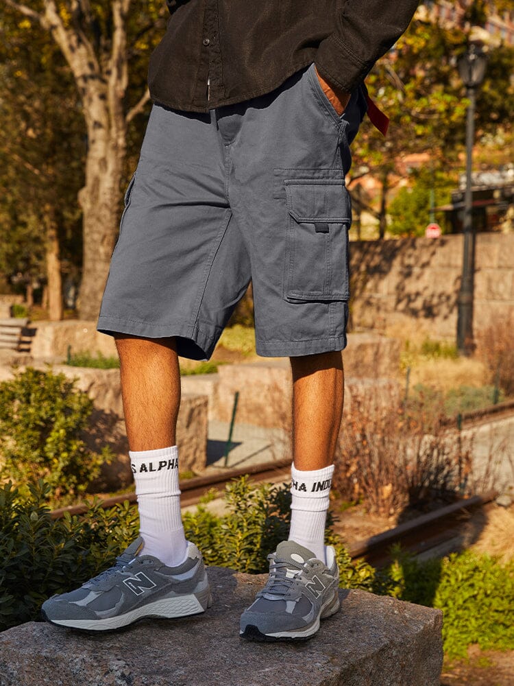 Alpha Industries Crew Short, gray cargo shorts, zip and button closure.
