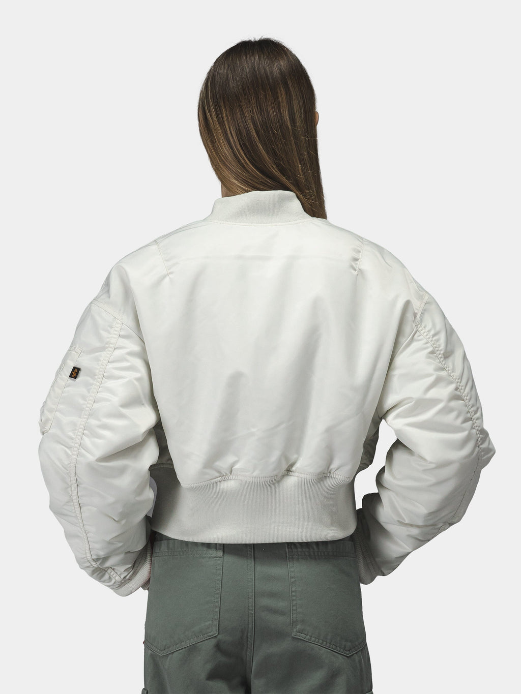 Alpha Industries Cropped MA-1 Flight Jacket Womens in white, featuring cropped length and classic bomber design.