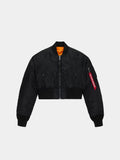 Alpha Industries Cropped MA-1 Flight Jacket Womens in black with front zipper, ribbed cuffs and hem, angled pockets, red sleeve tag, orange lining.