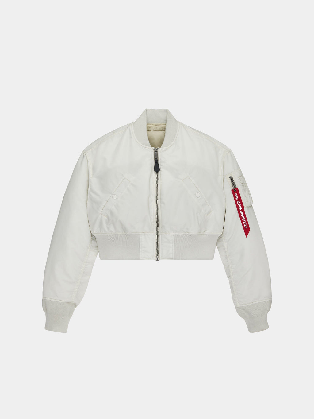 Alpha Industries Cropped MA-1 Flight Jacket Womens in Dune White with front zip, ribbed cuffs and hem, sleeve pocket with red tag.