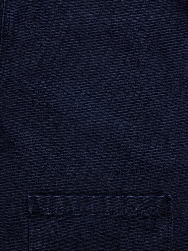 Alpha Industries Womens Canvas Chore Coat, dark blue canvas, pocket, bottom edge stitching, button-down closure.