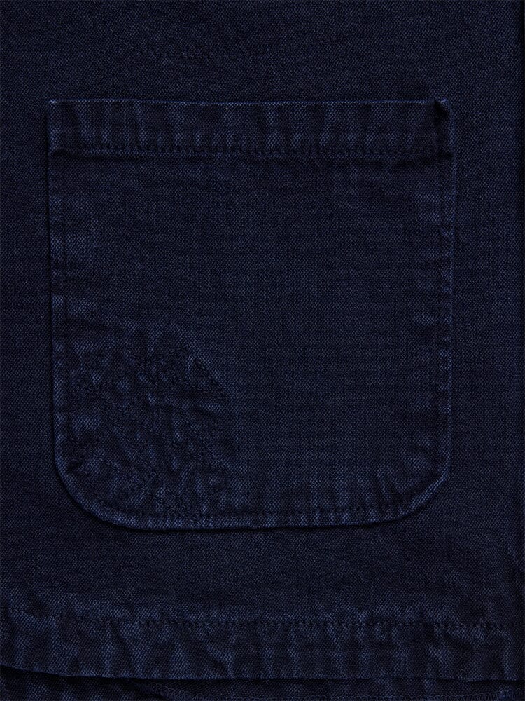 Womens Canvas Chore Coat by Alpha Industries, dark blue, canvas material, button-down closure, pocket with visible stitching, subtle textured pattern.