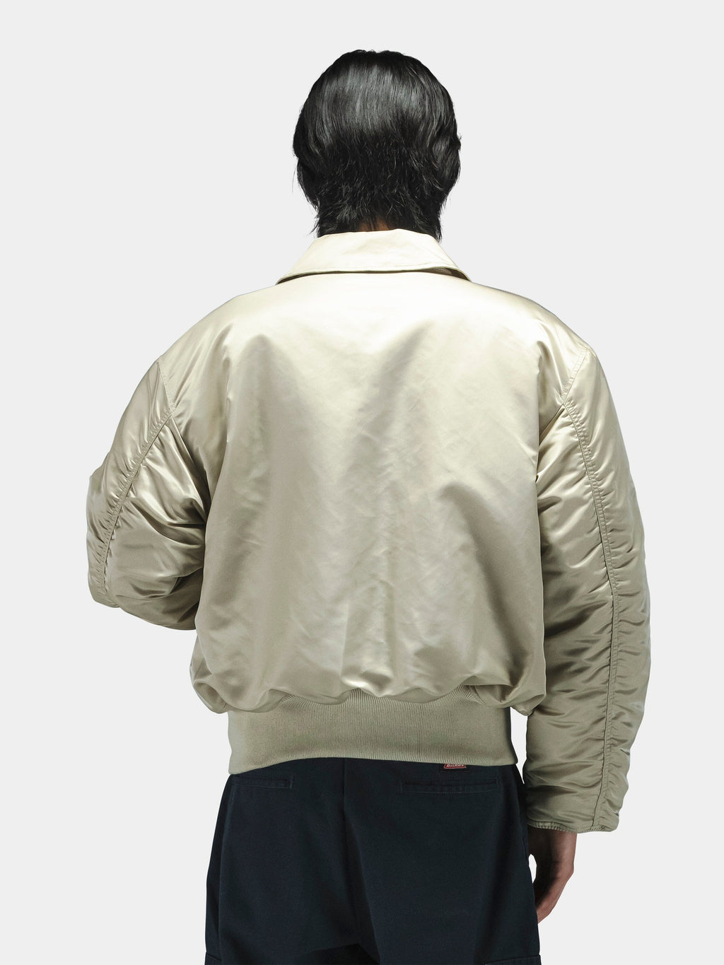 Alpha Industries Cwu 45/P Bomber Jacket in light color with shiny finish and classic design details.