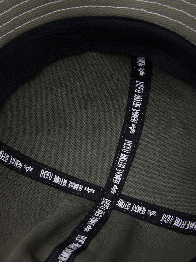 Canvas Daisy Mae MA-1 Bucket Hat by Alpha Industries, dark green with black fabric bands and white text.