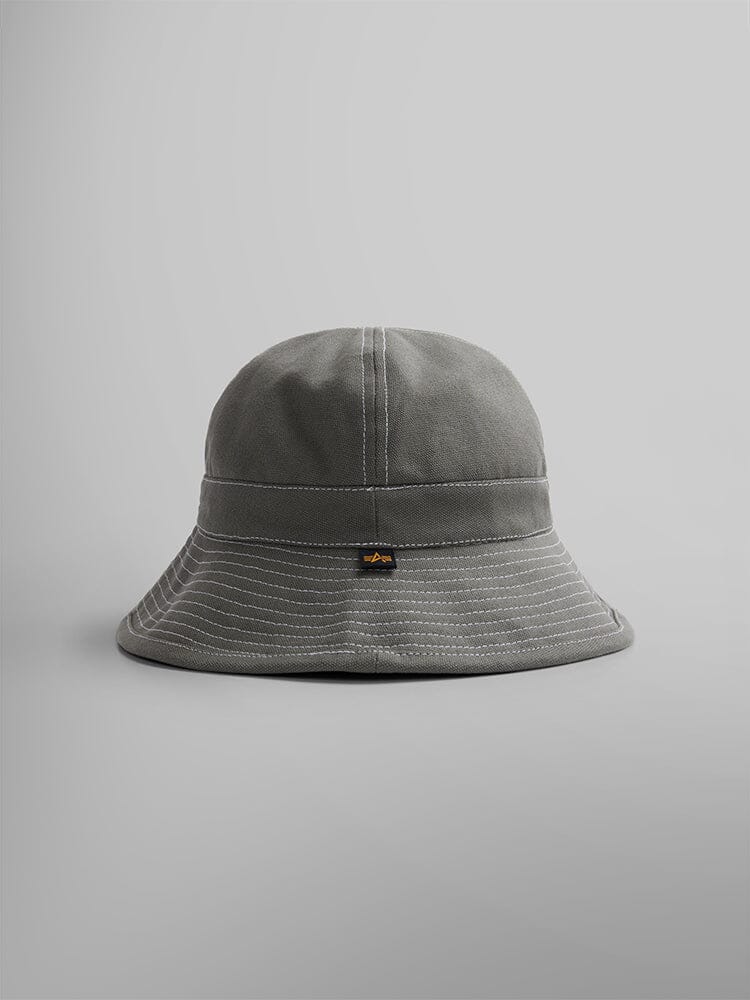Alpha Industries Canvas Daisy Mae MA-1 Bucket Hat in Aircraft Gray with visible white stitching and a small black and gold front tag.