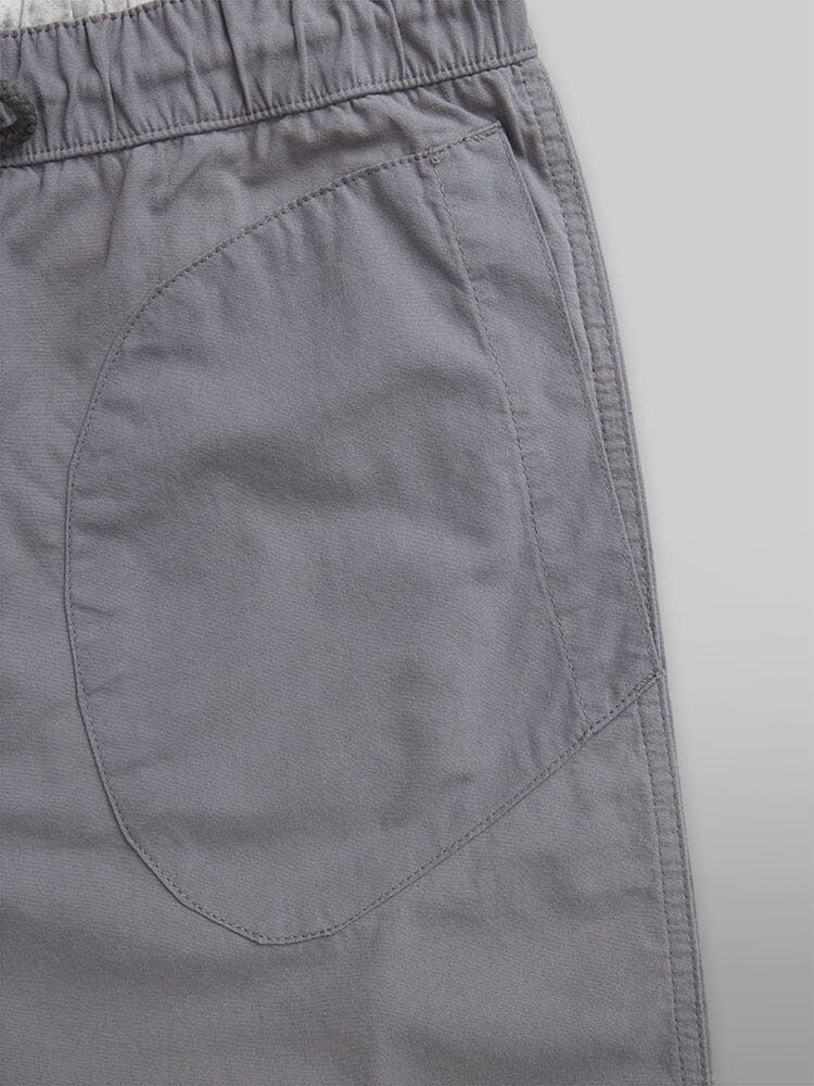 Alpha Industries Deck Shorts, gray fabric, visible stitching, breathable elastic waistband.