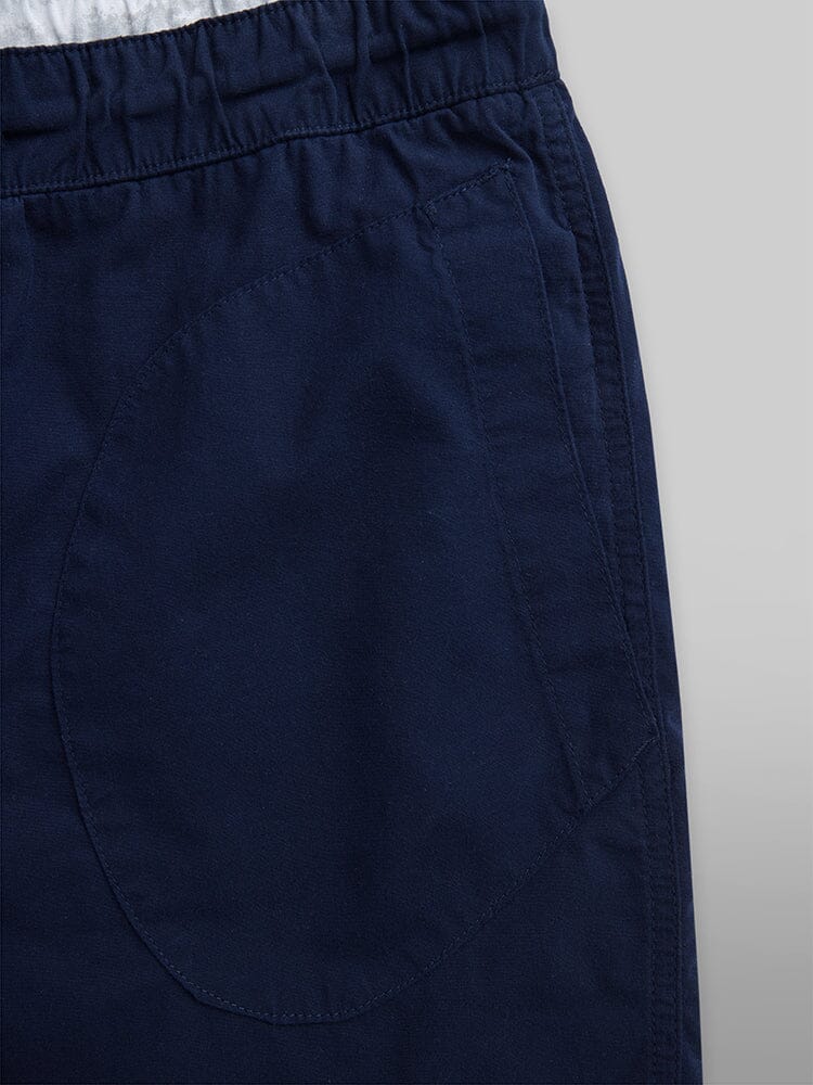 Alpha Industries Deck Shorts in navy blue with side pocket and waistband.