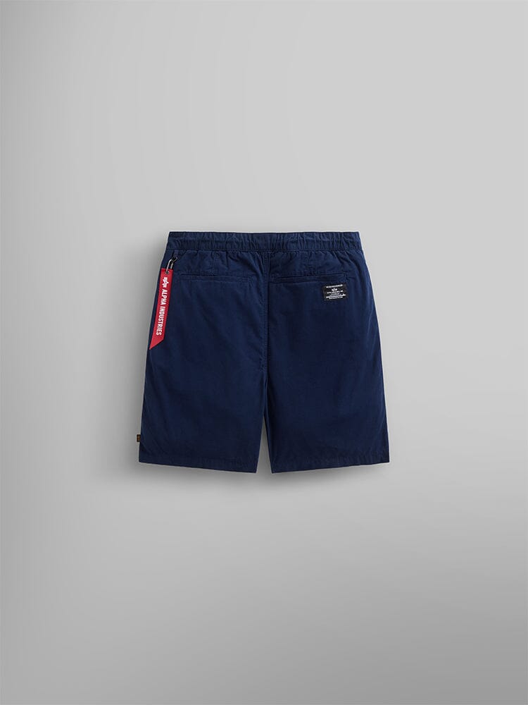 Deck Shorts Alpha Industries, navy blue, two rear pockets, red tag on left pocket, small patch near right.