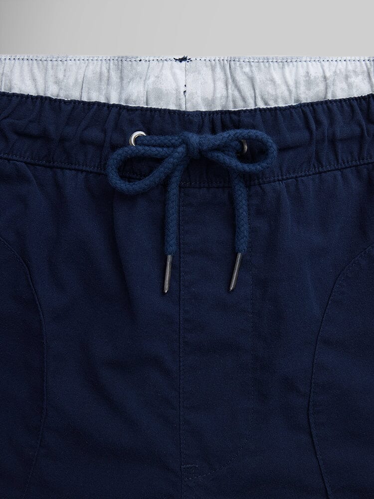Alpha Industries Deck Shorts, navy blue, breathable fabric, elastic waistband, metal-tipped drawcord.