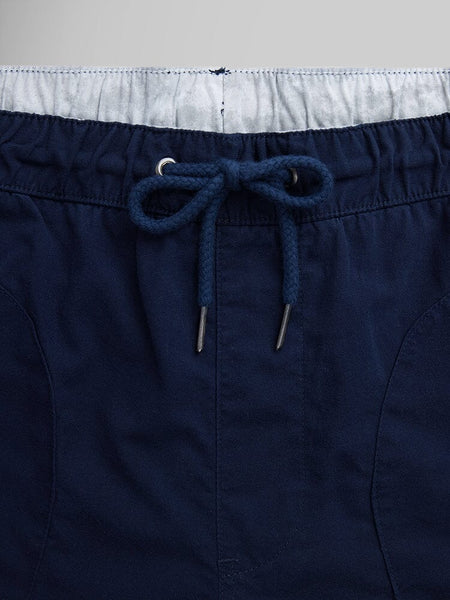 Alpha Industries Deck Shorts, navy blue, breathable fabric, elastic waistband, metal-tipped drawcord.