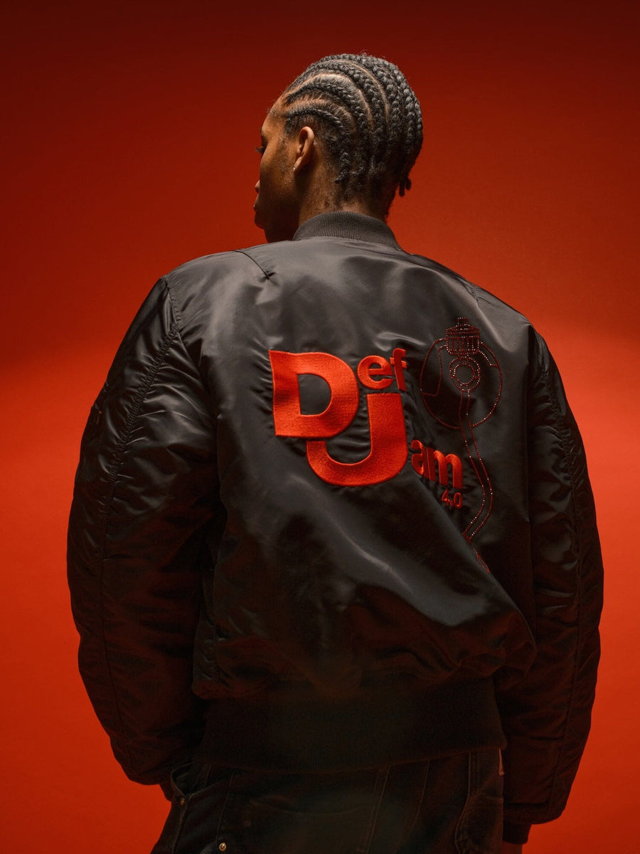 Alpha Industries Def Jam 40th Anniversary X Alpha MA-1 Bomber Jacket, red with orange Def Jam logo on back.