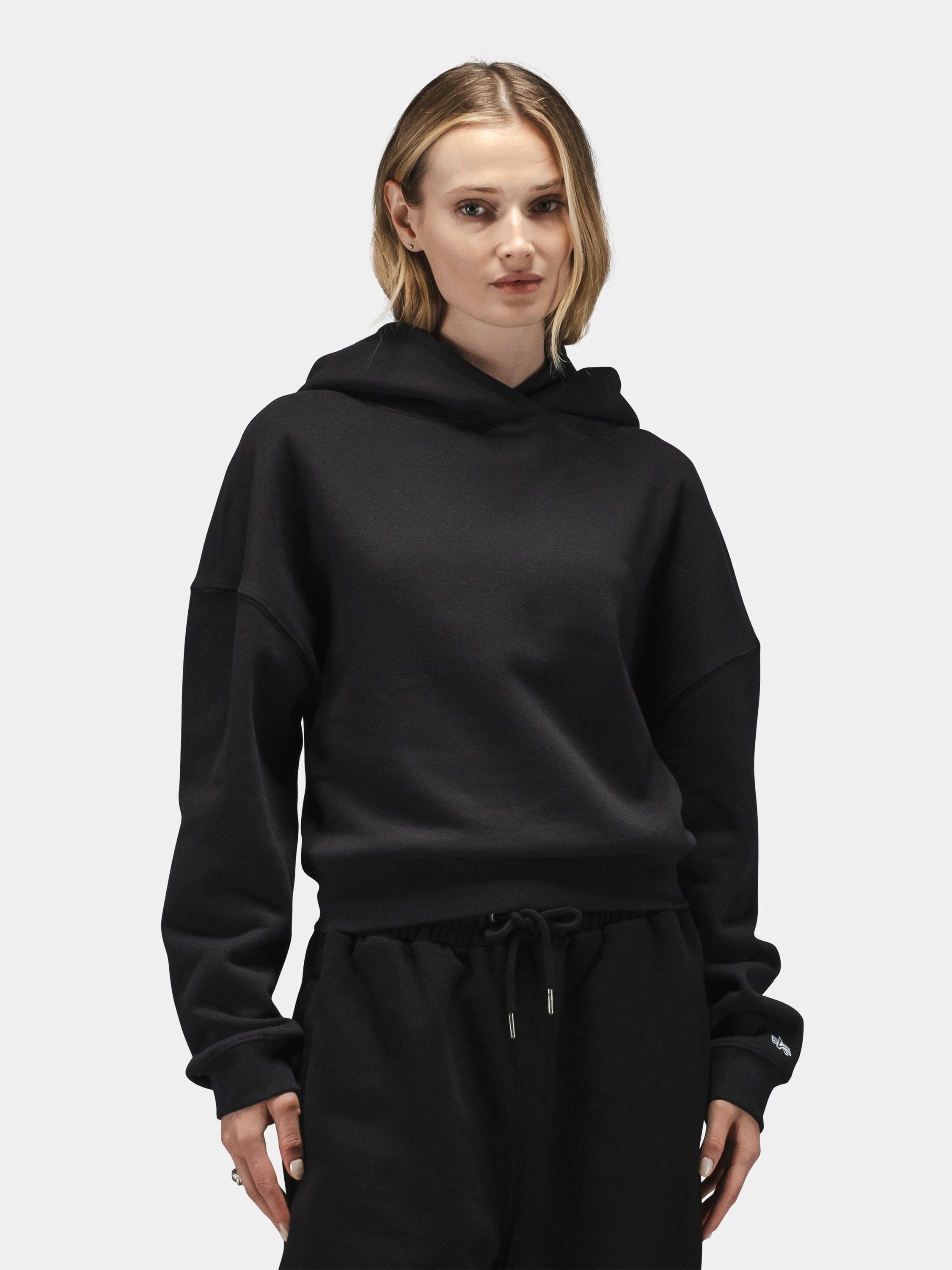Alpha Industries Essential Cropped Hoodie Womens in black with matching black pants.