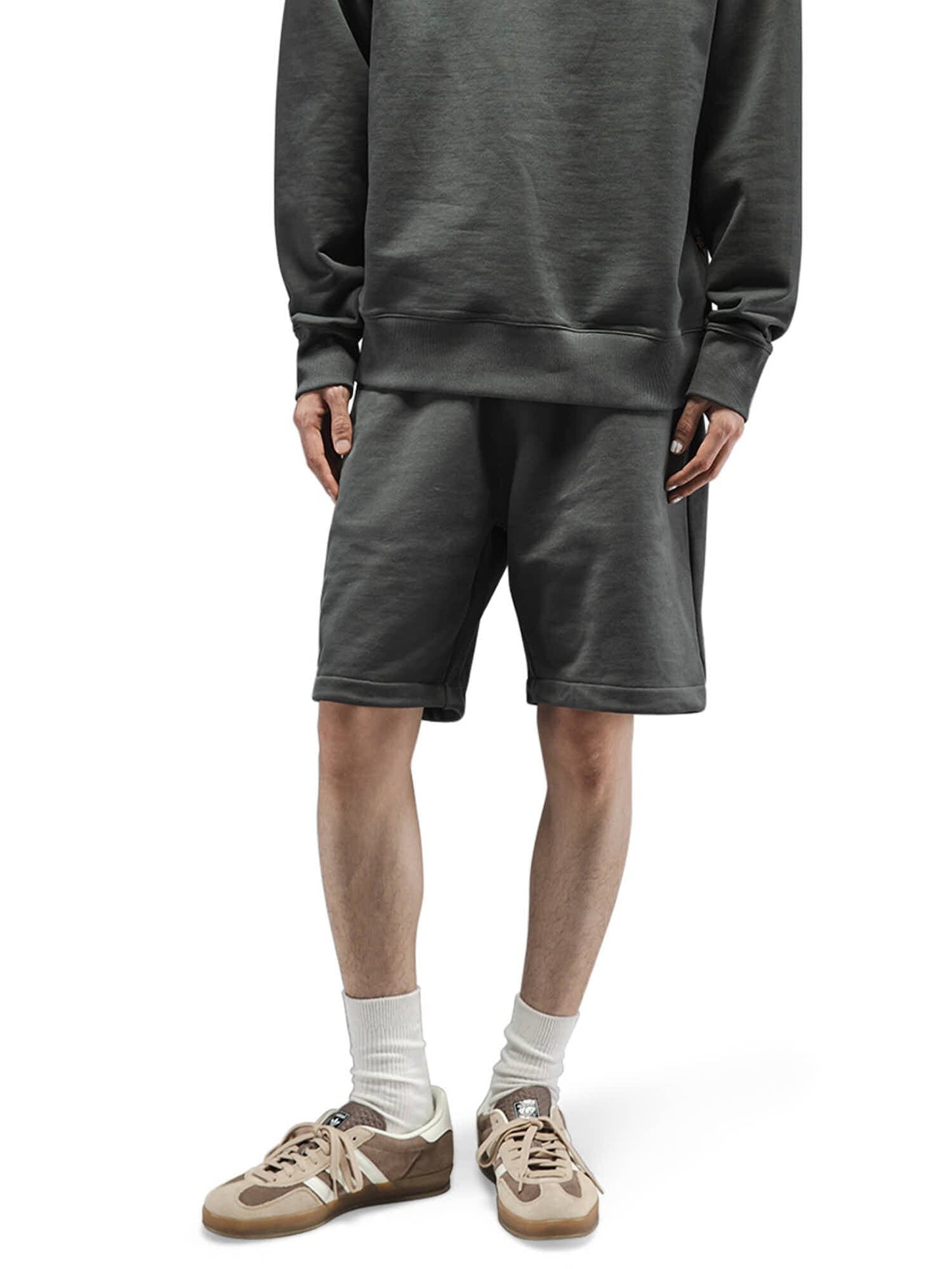 Alpha Industries Essential French Terry Short, light-colored fabric, elastic waistband, drawstring closure.